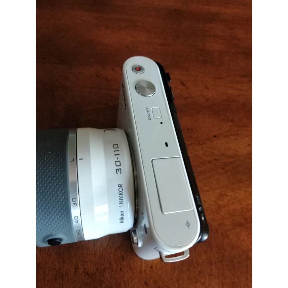 READ* Nikon 1 J1 White Digital Camera with 1 NIKKOR 10-30mm VR Lens